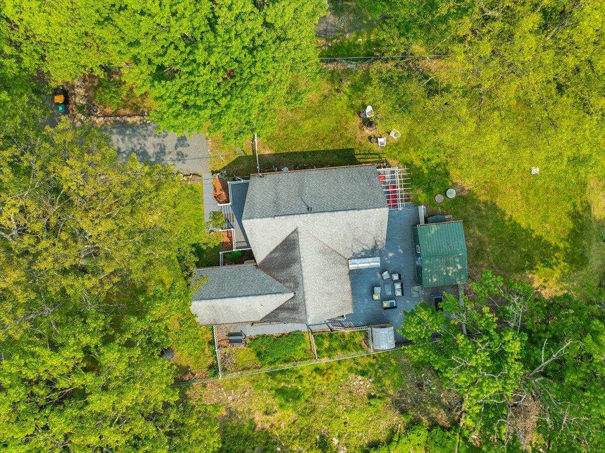 3137 Fern Road Pocono Summit, PA 18346 - Photo 4 of 51 an aerial view of a house with swimming pool and large trees