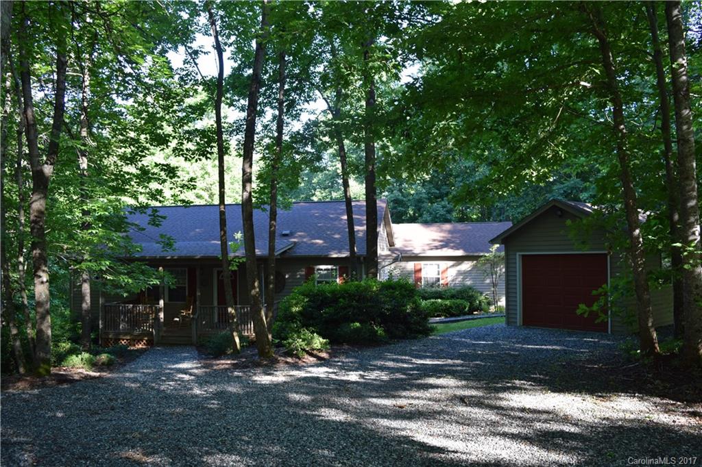 171 Observation Ridge Rutherfordton, NC 28139 - Photo 1 of 24 a front view of a house with a yard and tree s