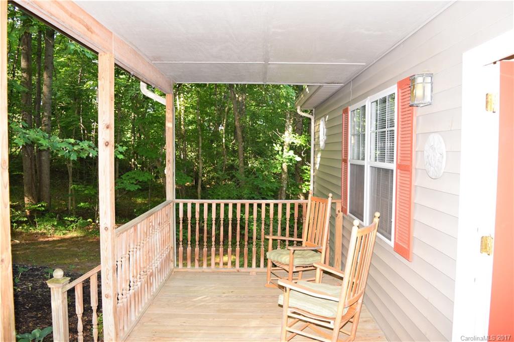 171 Observation Ridge Rutherfordton, NC 28139 - Photo 14 of 24 a view of a balcony with wooden floor