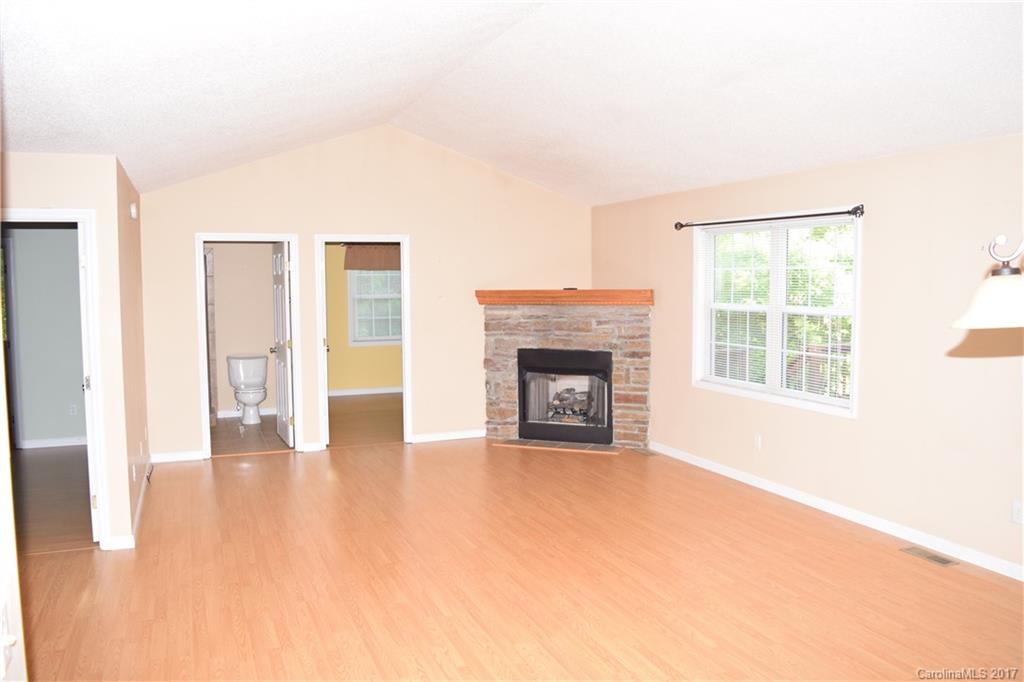 171 Observation Ridge Rutherfordton, NC 28139 - Photo 5 of 24 a view of an empty room with glass door and windows