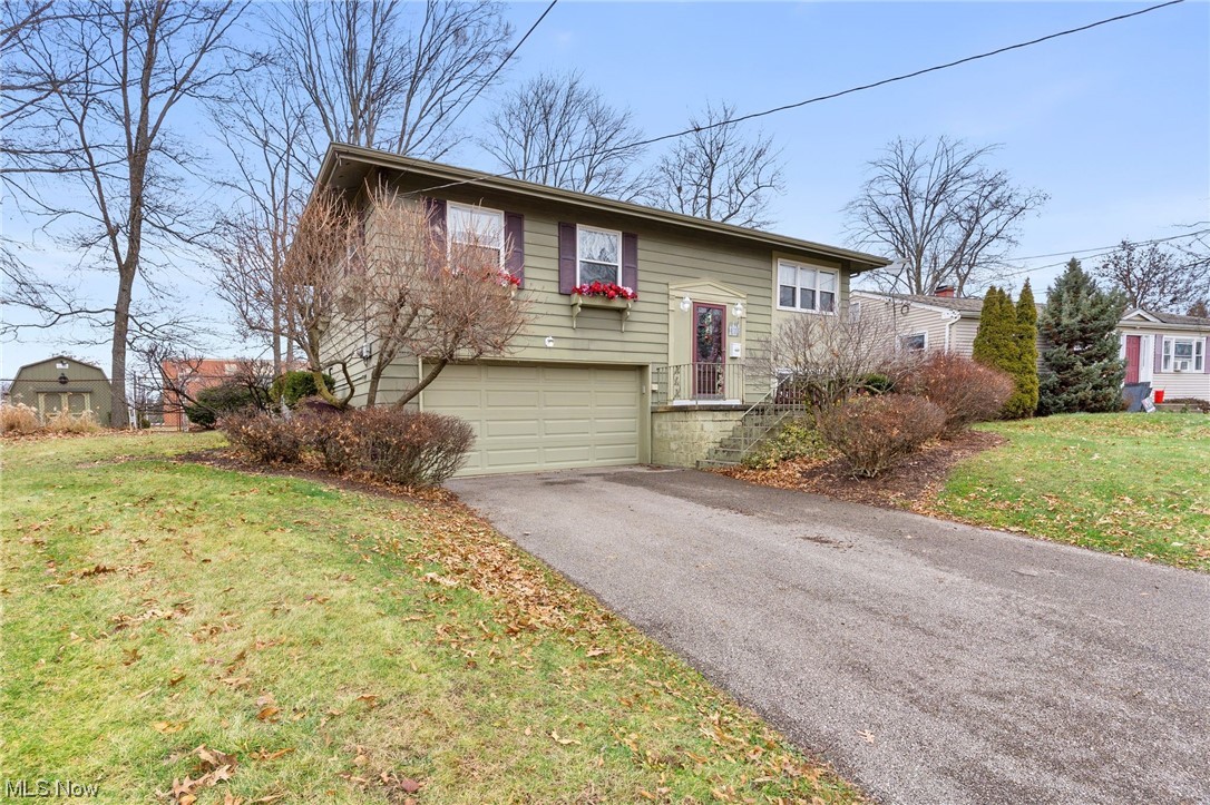 4686 Burkey Road Youngstown, OH 44515 - Photo 2 of 22 Bi-level home with a garage and a front lawn