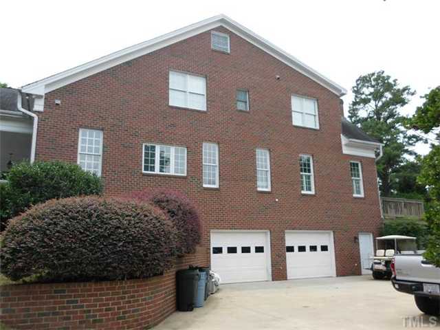 3100 Darien Drive Raleigh, NC 27607 - Photo 17 of 17 a front view of a house with large windows