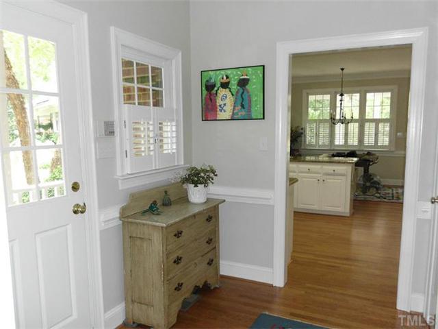 3100 Darien Drive Raleigh, NC 27607 - Photo 5 of 17 a kitchen with a stove a sink and a refrigerator