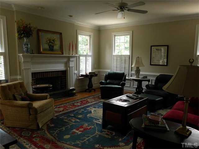 3100 Darien Drive Raleigh, NC 27607 - Photo 7 of 17 a living room with furniture and a fireplace