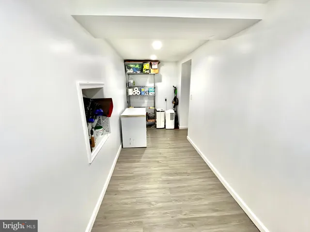 a view of a refrigerator in a kitchen