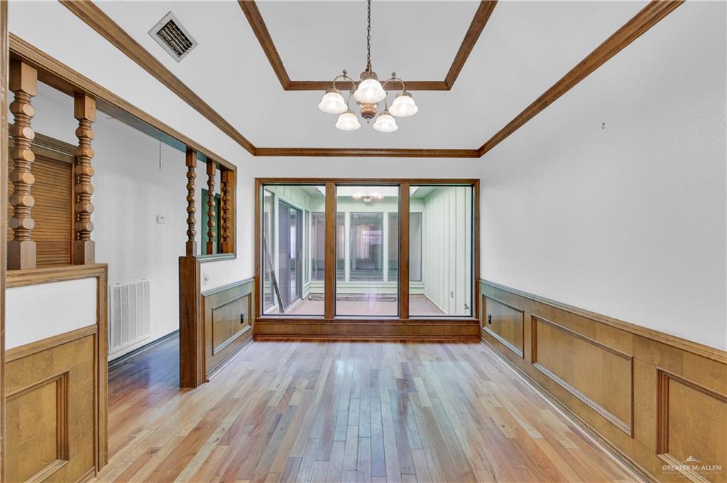 2016 South 5th Street, Unit 17 McAllen, TX 78503 - Photo 15 of 20 a view of a room with wooden floor and fan