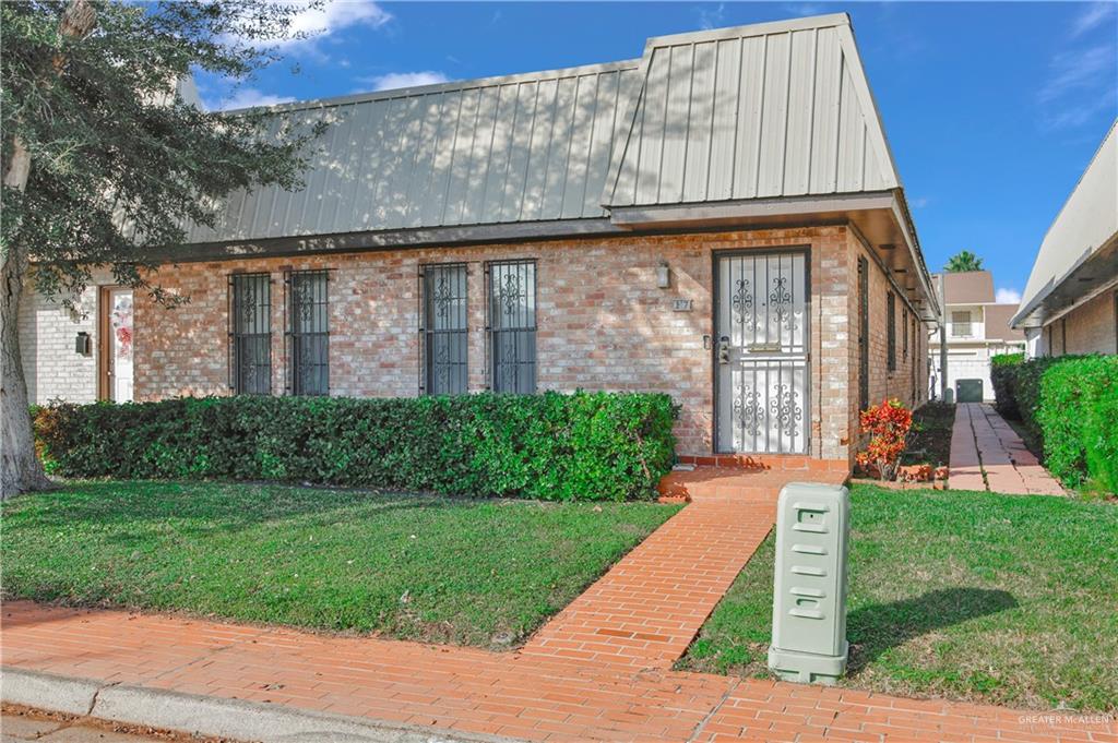 2016 South 5th Street, Unit 17 McAllen, TX 78503 - Photo 3 of 20 a front view of house with yard
