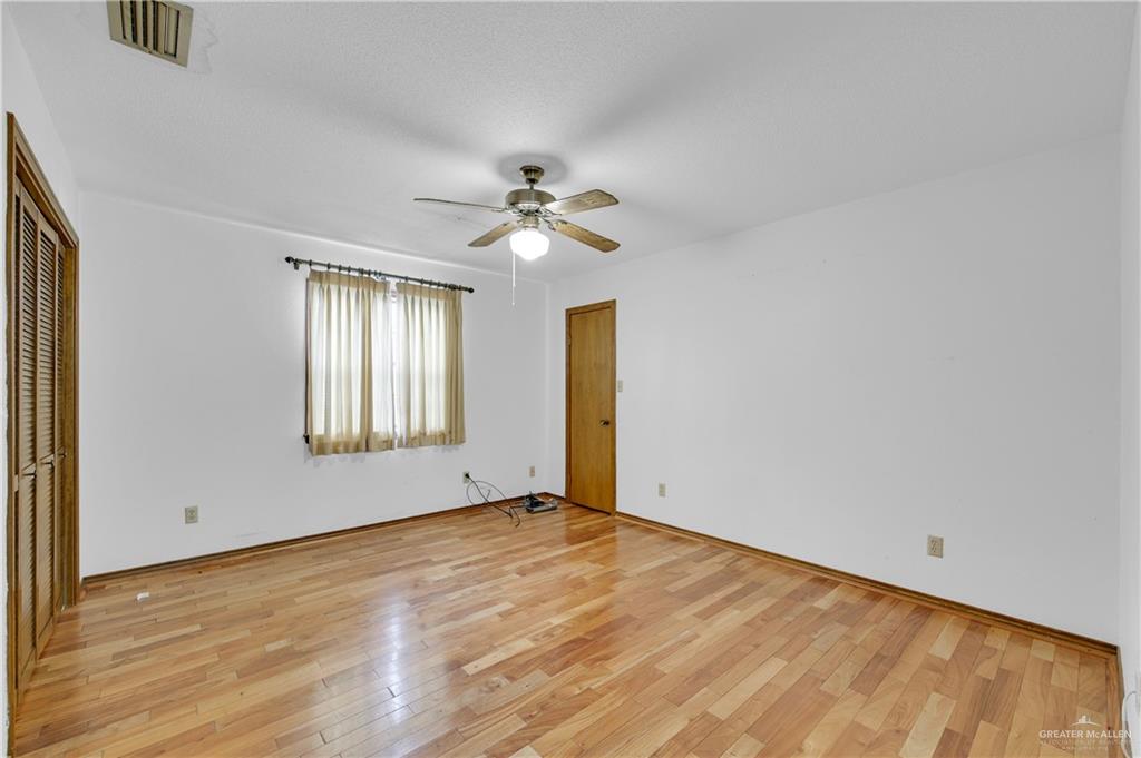 2016 South 5th Street, Unit 17 McAllen, TX 78503 - Photo 8 of 20 a view of an empty room with window
