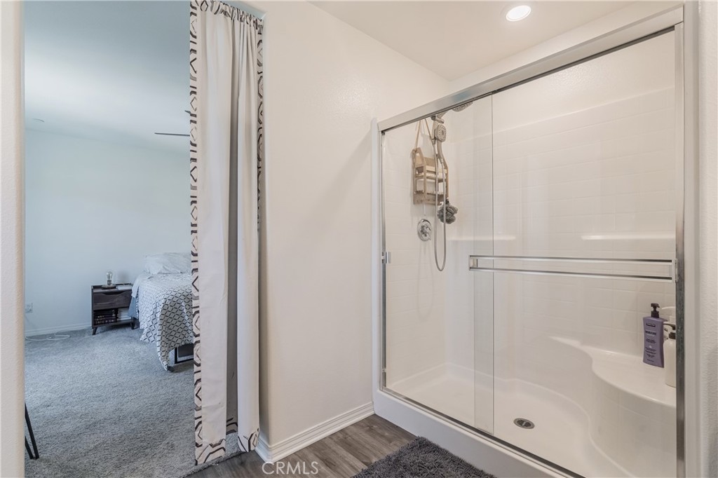 41973 Rondo Street, Unit 1203 Murrieta, CA 92562 - Photo 20 of 48 a bathroom with a shower