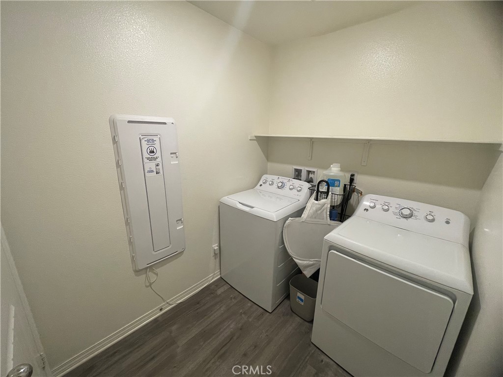 41973 Rondo Street, Unit 1203 Murrieta, CA 92562 - Photo 29 of 48 a utility room with dryer and washer