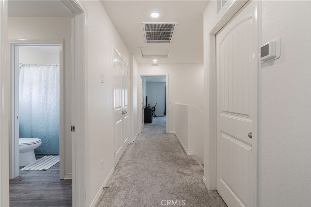41973 Rondo Street, Unit 1203 Murrieta, CA 92562 - Photo 30 of 48 a view of a bathroom from the hallway