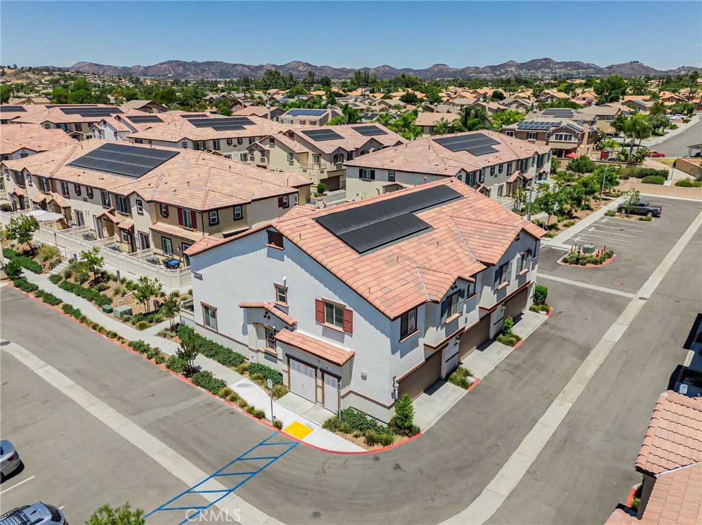 41973 Rondo Street, Unit 1203 Murrieta, CA 92562 - Photo 36 of 48 an aerial view of residential houses with outdoor space