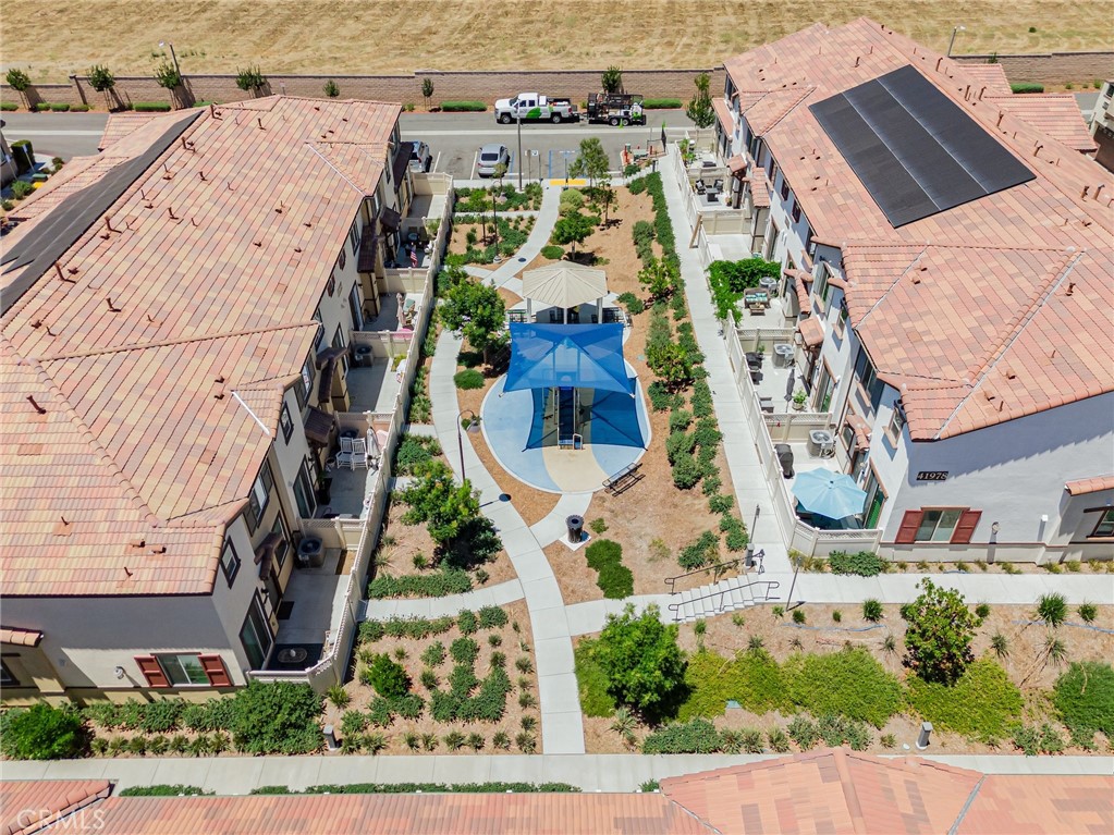 41973 Rondo Street, Unit 1203 Murrieta, CA 92562 - Photo 44 of 48 an aerial view of residential houses with outdoor space