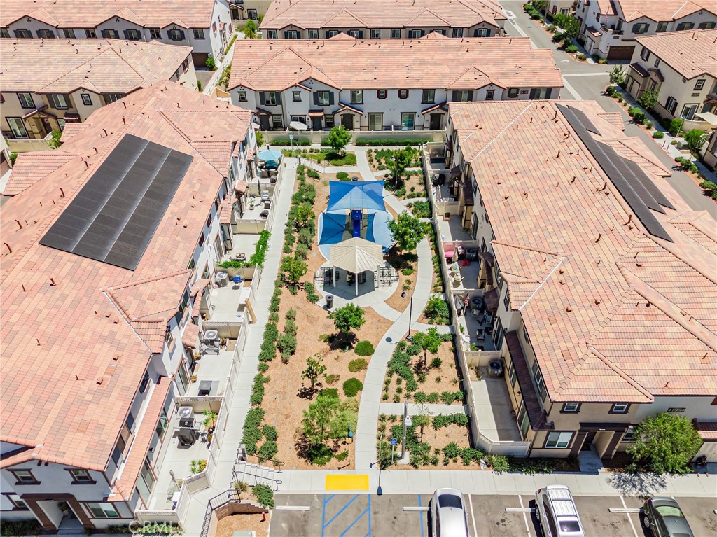 41973 Rondo Street, Unit 1203 Murrieta, CA 92562 - Photo 46 of 48 an aerial view of residential houses with outdoor space
