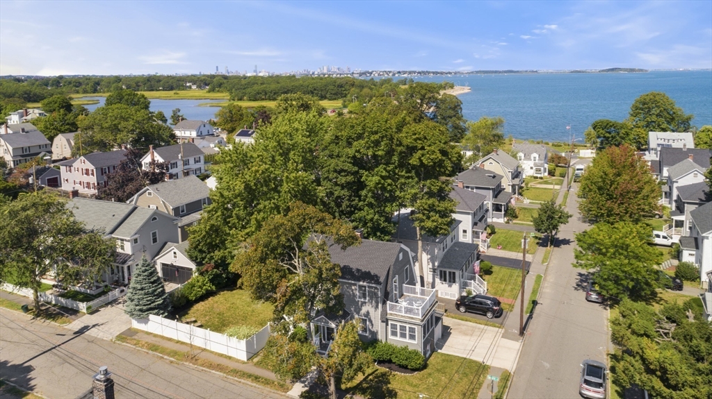 80 Squanto Road Quincy, MA 02169 - Photo 1 of 42 an aerial view of multiple house with outdoor space