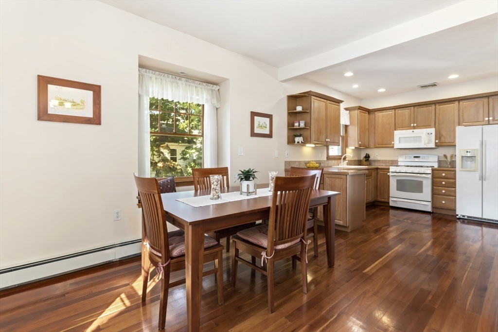 80 Squanto Road Quincy, MA 02169 - Photo 12 of 42 a view of a dining room with furniture window and wooden floor