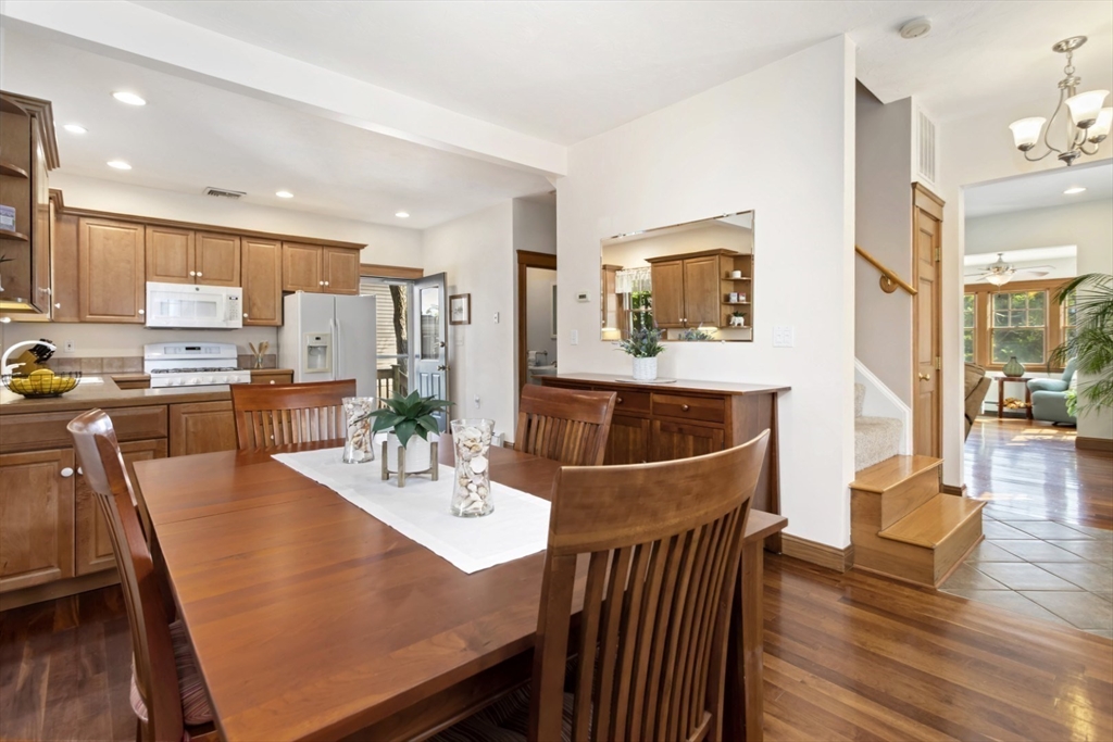 80 Squanto Road Quincy, MA 02169 - Photo 13 of 42 a dining room with furniture and wooden floor