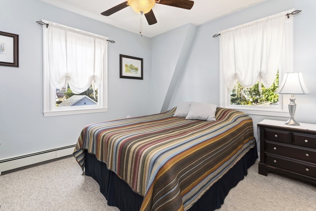 80 Squanto Road Quincy, MA 02169 - Photo 24 of 42 a bedroom with a bed and a window