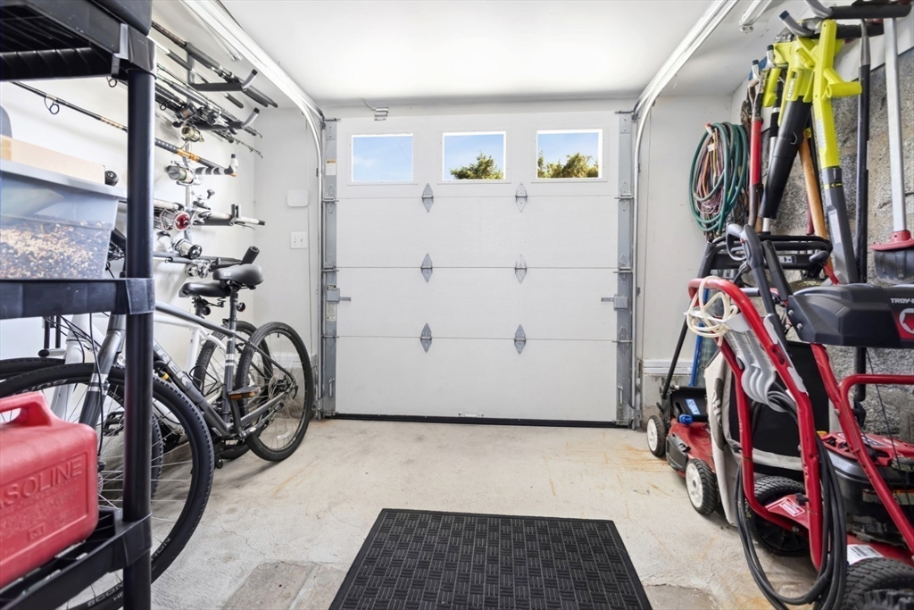 80 Squanto Road Quincy, MA 02169 - Photo 30 of 42 a view of walk in closet with clothes and shoes