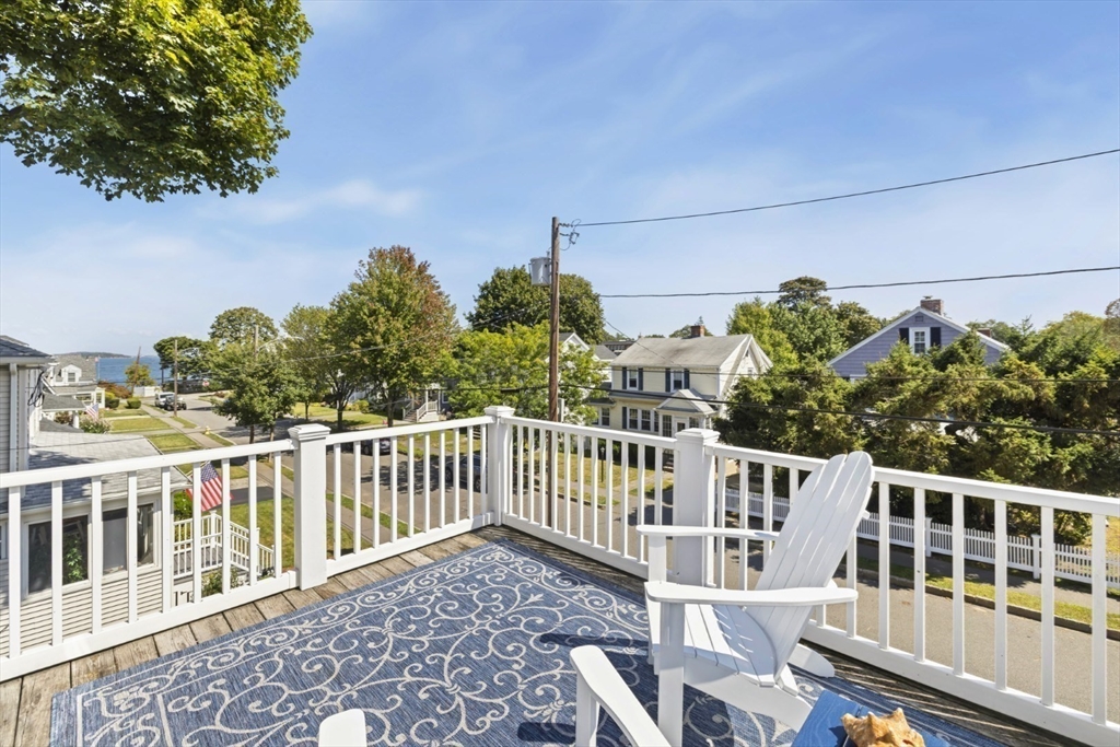 80 Squanto Road Quincy, MA 02169 - Photo 32 of 42 a balcony view with a garden