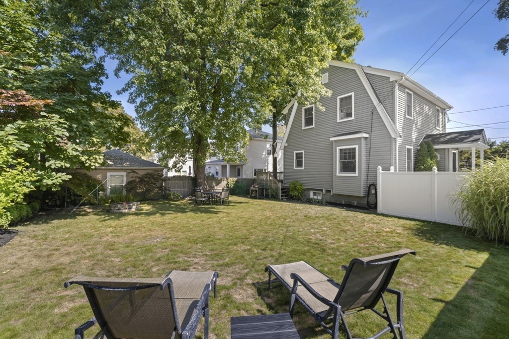 80 Squanto Road Quincy, MA 02169 - Photo 34 of 42 a view of house with yard outdoor seating and barbeque oven