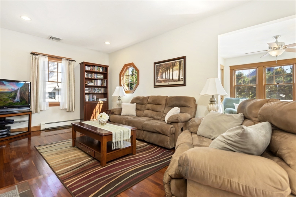 80 Squanto Road Quincy, MA 02169 - Photo 6 of 42 a living room with furniture and a flat screen tv