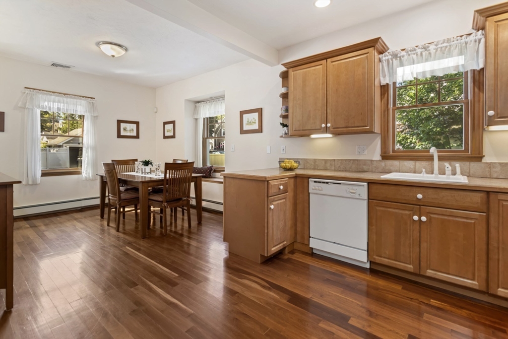 80 Squanto Road Quincy, MA 02169 - Photo 10 of 42 a kitchen with a sink a counter top space and stainless steel appliances