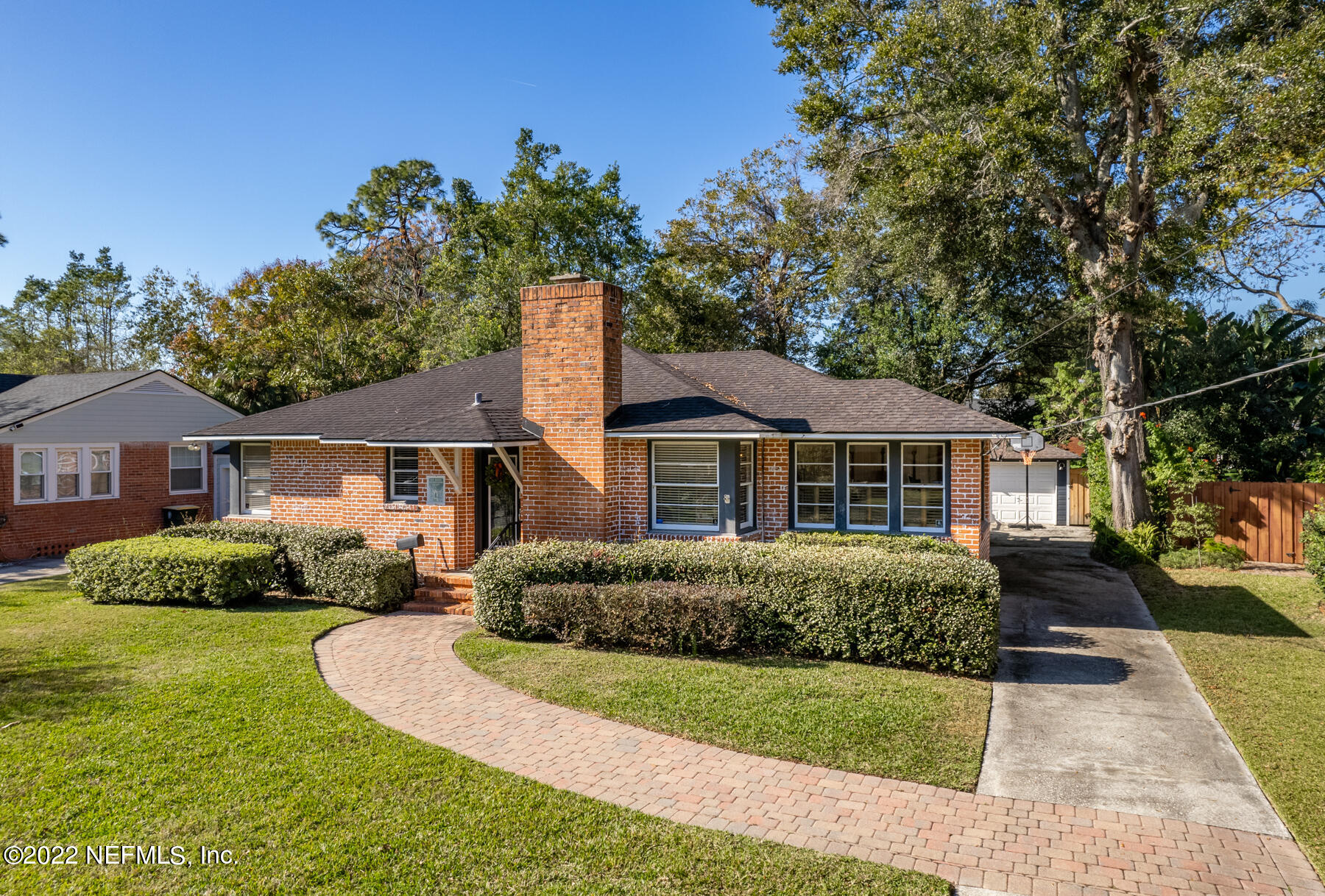 4068 London Road Jacksonville, FL 32207 - Photo 1 of 29 a front view of a house with a yard
