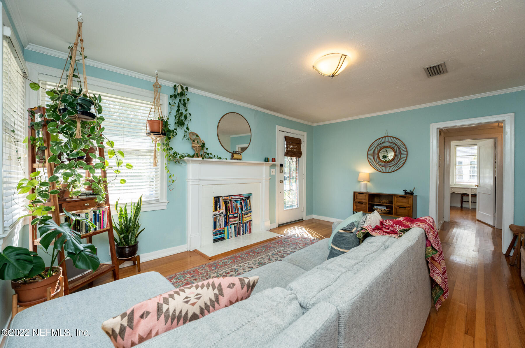 4068 London Road Jacksonville, FL 32207 - Photo 5 of 29 a living room with furniture and a fireplace