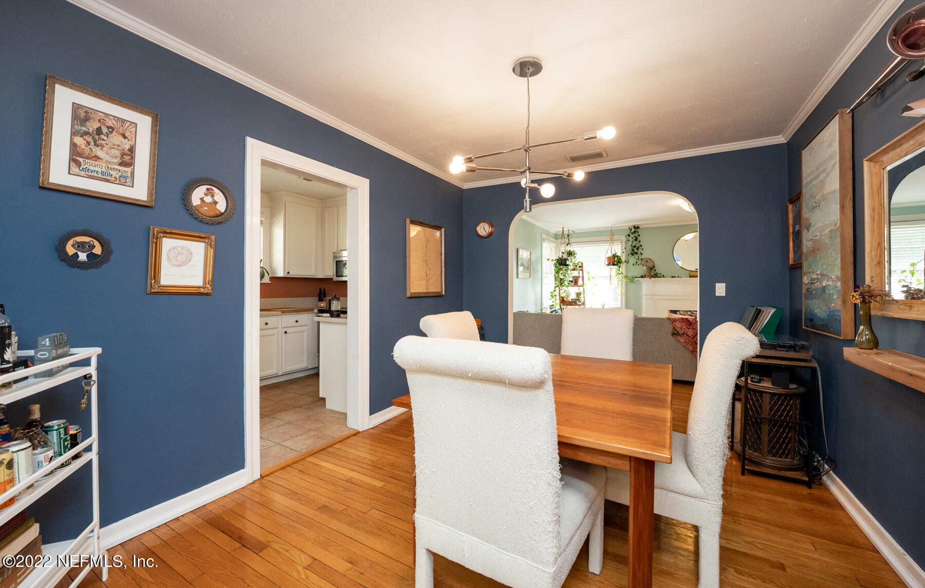 4068 London Road Jacksonville, FL 32207 - Photo 9 of 29 a view of a dining room with furniture and wooden floor