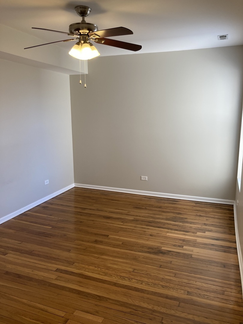 4042 South Calumet Avenue, Unit 3S Chicago, IL 60653 - Photo 11 of 11 a view of a room with an empty space