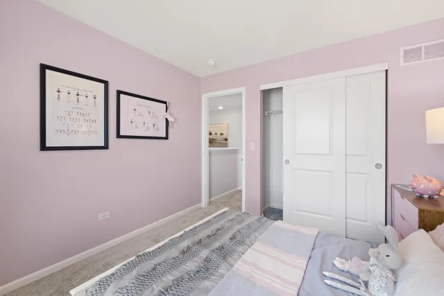 a bedroom with a bed and the view of bedroom