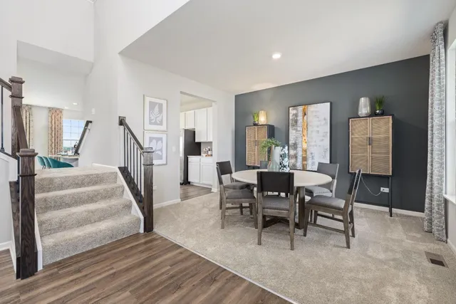 a view of a livingroom with furniture and a window