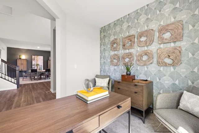 a living room with furniture and a table