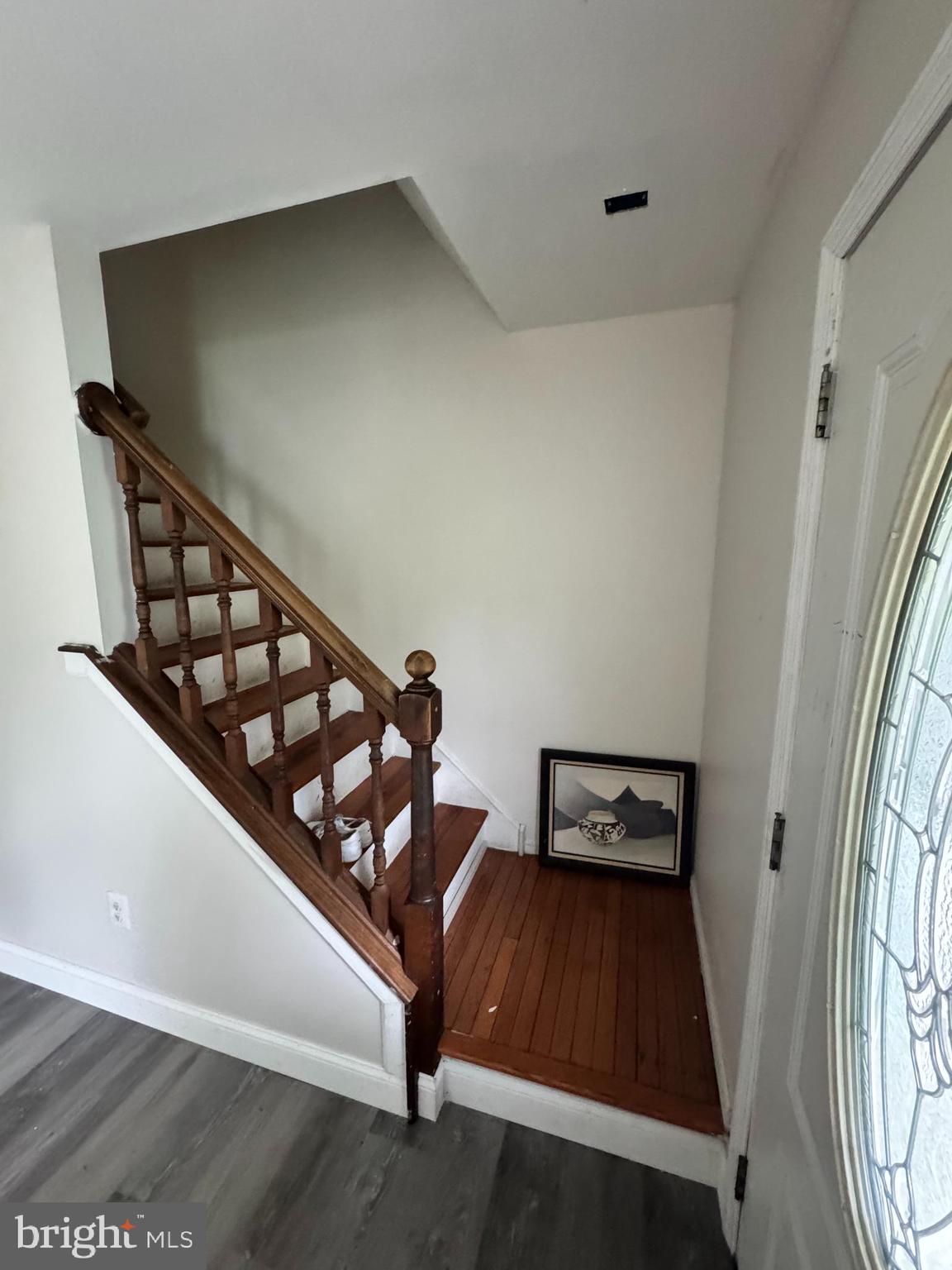461 Old Erial Road Sicklerville, NJ 08081 - Photo 13 of 34 a view of a livingroom with wooden floor and staircase