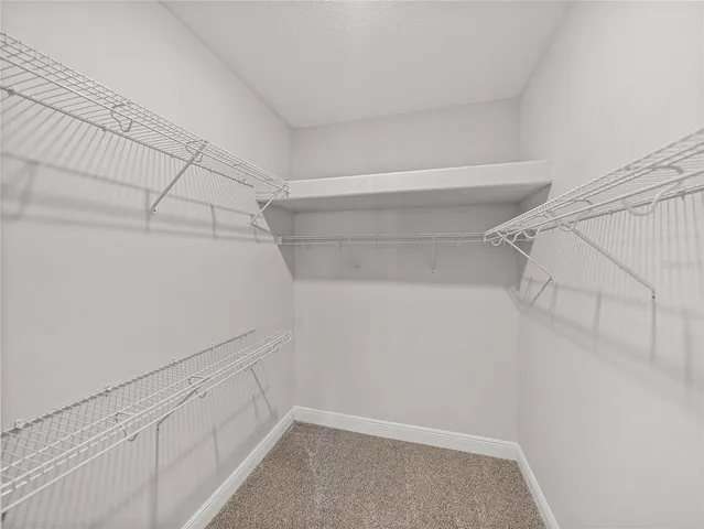 a room with cabinets and wooden floor