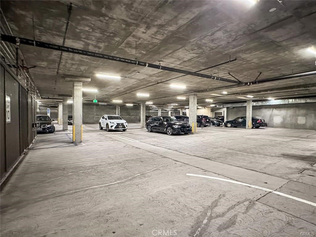 931 East Walnut Street, Unit 607 Pasadena, CA 91106 - Photo 27 of 30 a view of parking garage with cars