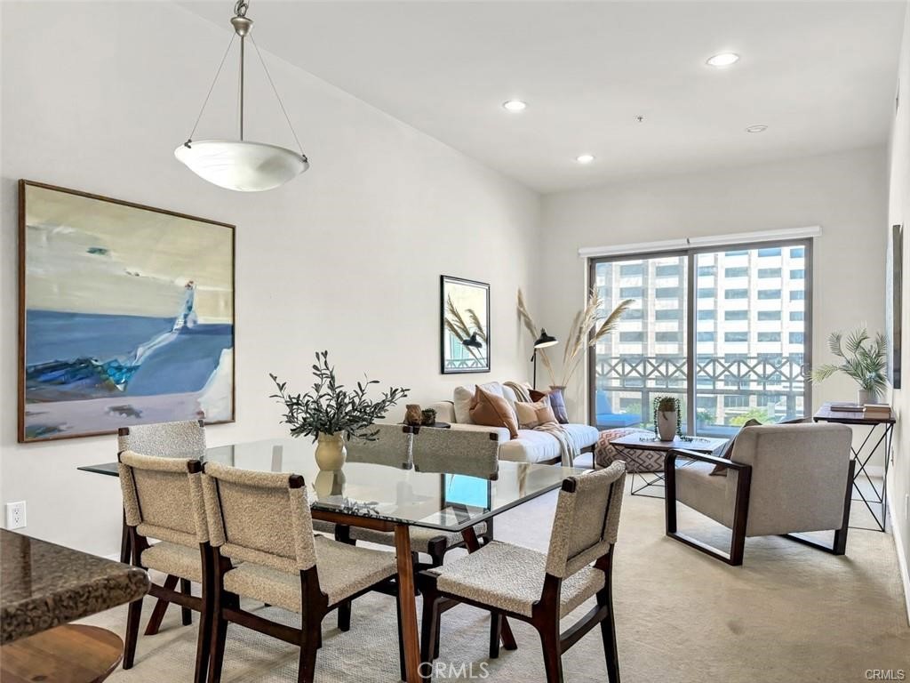 931 East Walnut Street, Unit 607 Pasadena, CA 91106 - Photo 9 of 30 a dining room with furniture and window