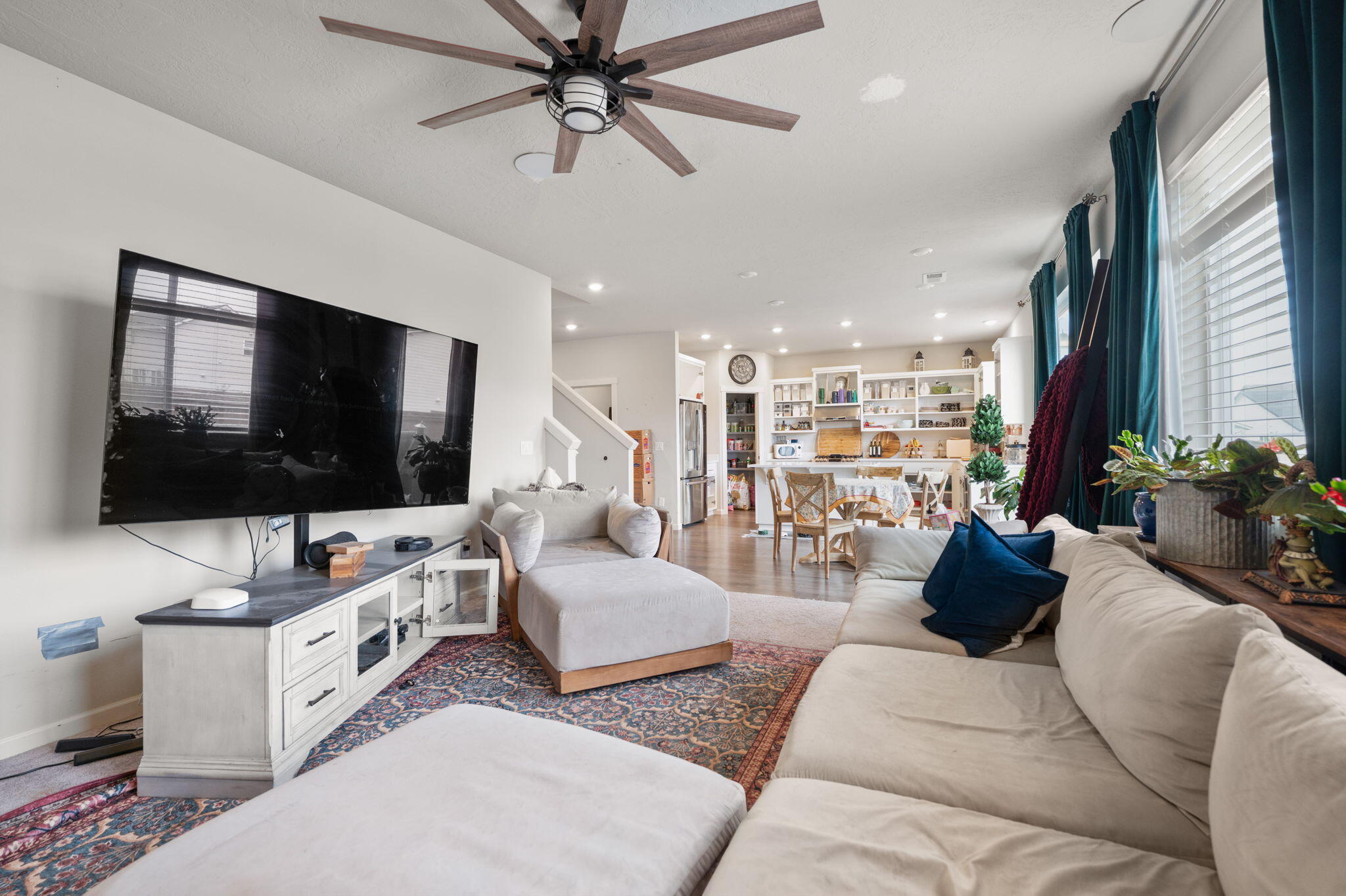 4039 Southwest Quartz Place Redmond, OR 97756 - Photo 21 of 44 a living room with furniture and a flat screen tv