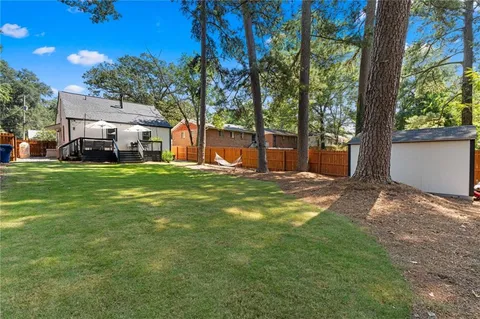 a wooden deck with a slide