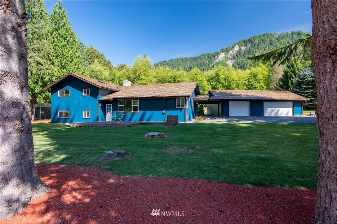 4086 Linnell Road Deming, WA 98244 - Photo 1 of 38 a view of a house with a yard