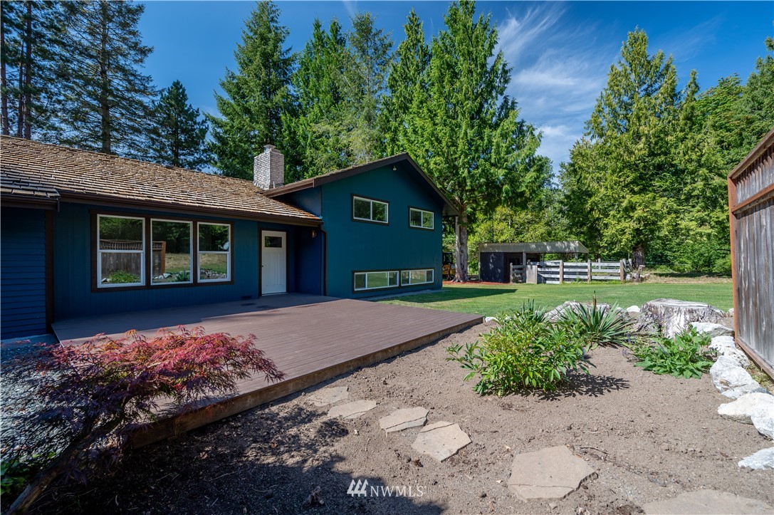 4086 Linnell Road Deming, WA 98244 - Photo 12 of 38 a front view of a house with a garden