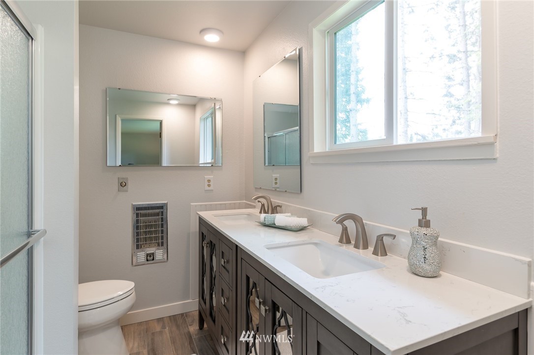 4086 Linnell Road Deming, WA 98244 - Photo 19 of 38 a bathroom with a sink and a toilet