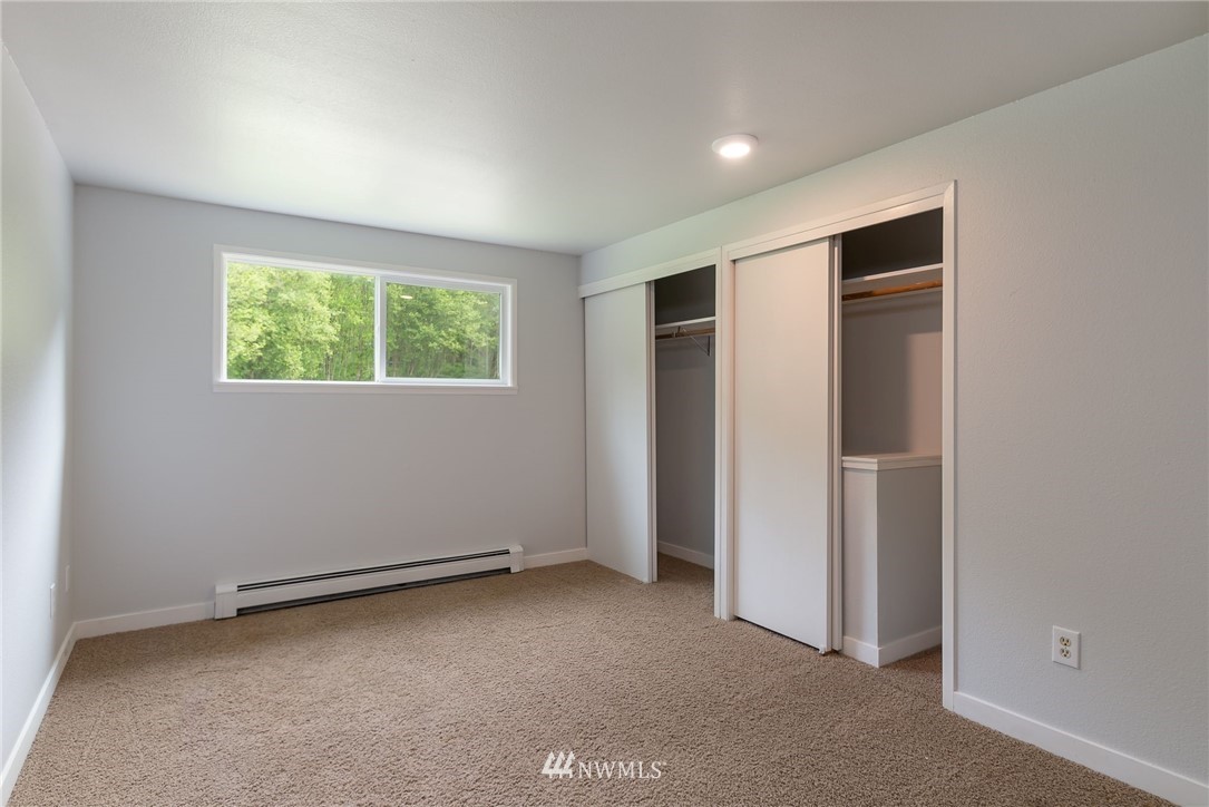 4086 Linnell Road Deming, WA 98244 - Photo 21 of 38 an empty room with windows and closet