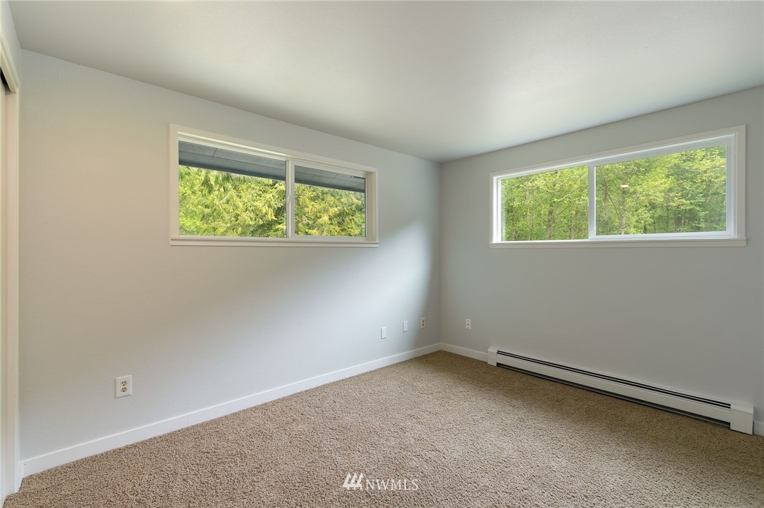 4086 Linnell Road Deming, WA 98244 - Photo 23 of 38 an empty room with windows