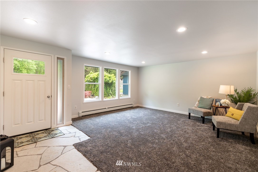 4086 Linnell Road Deming, WA 98244 - Photo 10 of 38 a living room with furniture and a window