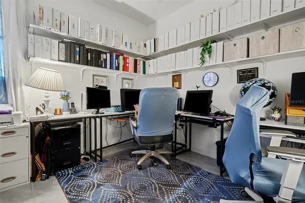 a view of workspace with lounge chair
