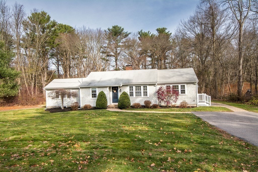 250 First Parish Road Scituate, MA 02066 - Photo 1 of 25 a front view of a house with a garden