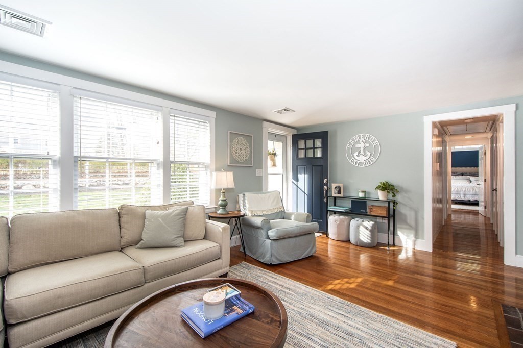 250 First Parish Road Scituate, MA 02066 - Photo 11 of 25 a living room with furniture wooden floor and a window