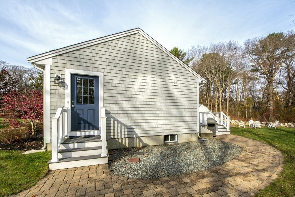 250 First Parish Road Scituate, MA 02066 - Photo 21 of 25 a view of a house with a yard